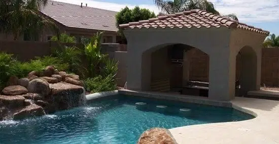Pool With Waterfall and Sunken Bar in Scottsdale