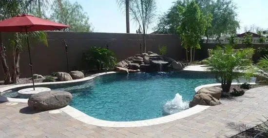 Curved pool with waterfall in Scottsdale