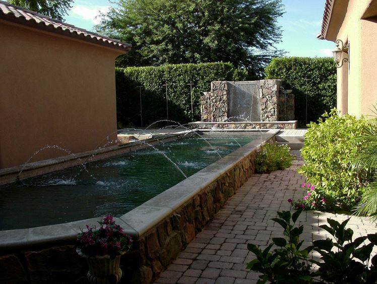 Great landscaping enhances this beautiful True Blue Pool